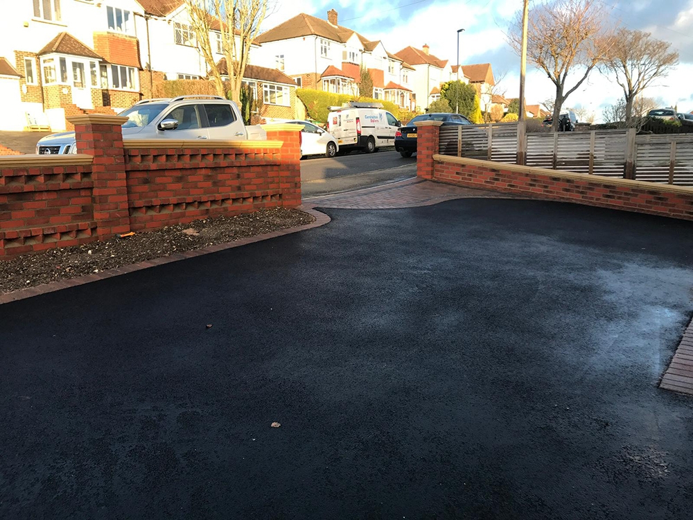 Fresh tarmac on driveway Fresh tarmac on driveway